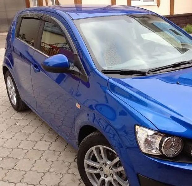 Дефлекторы окон "Acryl-Auto" на Chevrolet Aveo T300 58713 фото
